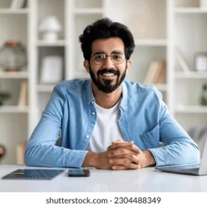 remote-career-smiling-young-indian-260nw-2304488349 remote-career-smiling-young-indian-260nw-2304488349